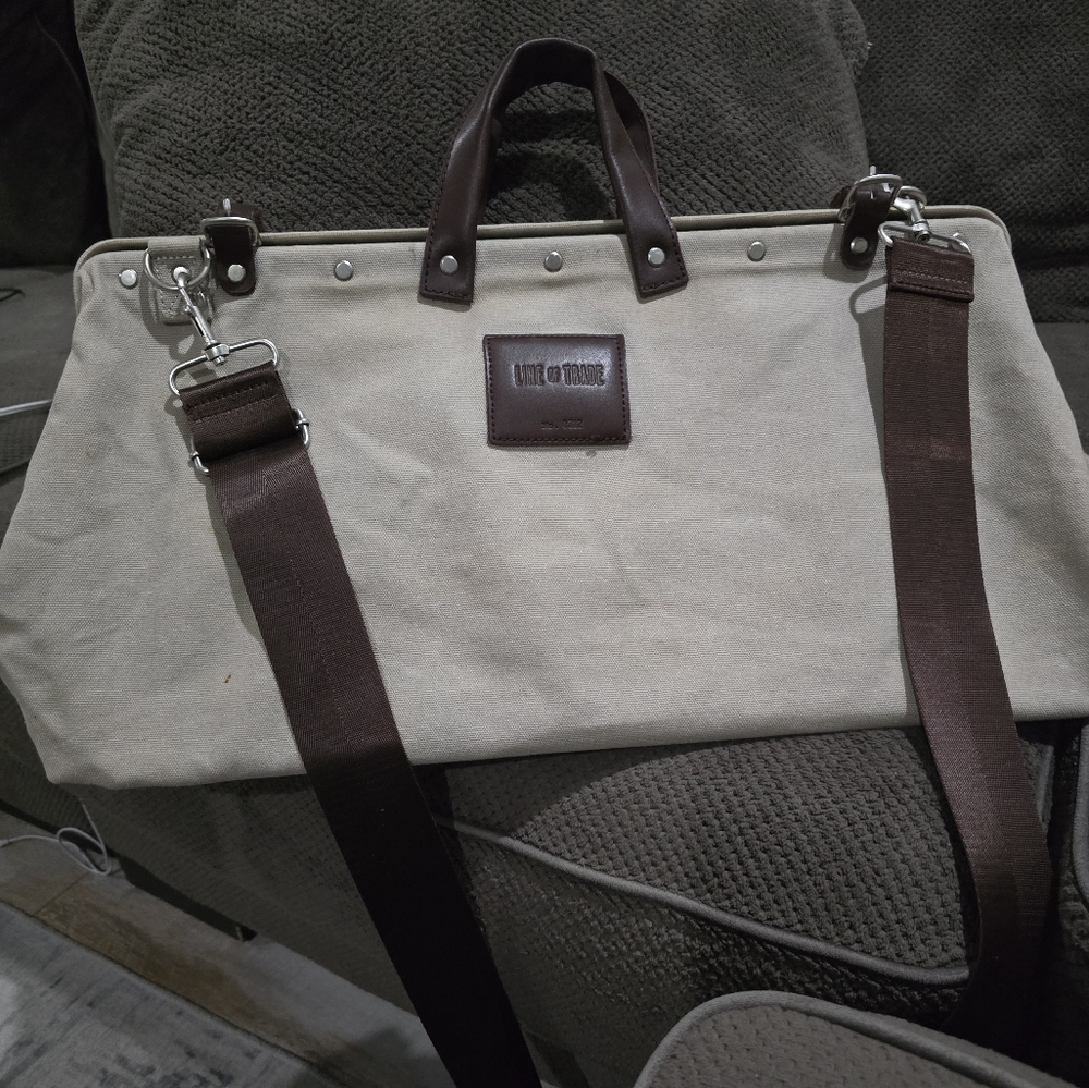 Cream and Brown Messenger Bag with Adjustable Straps and Minimalist Design